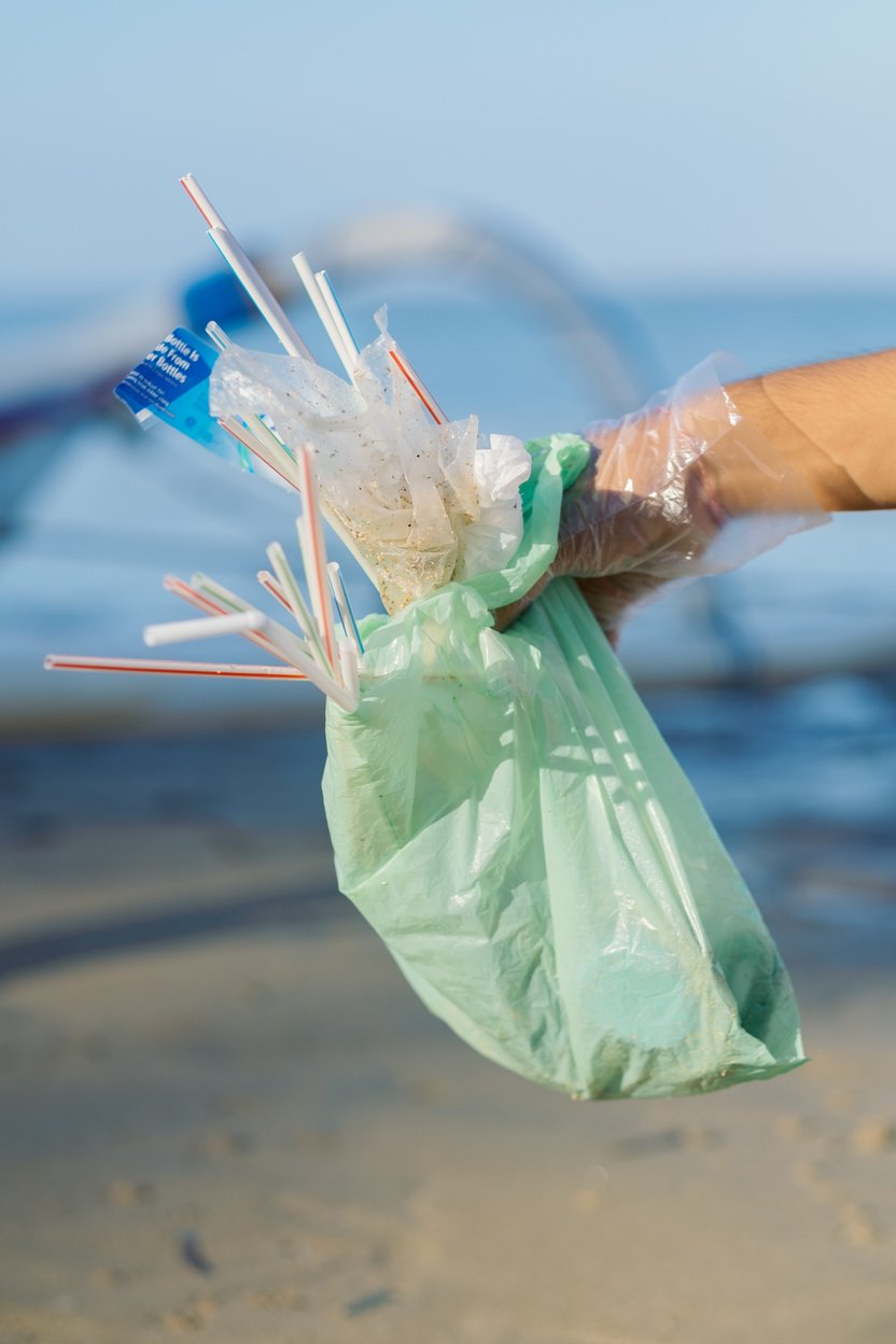 Hand  Holding Trash 